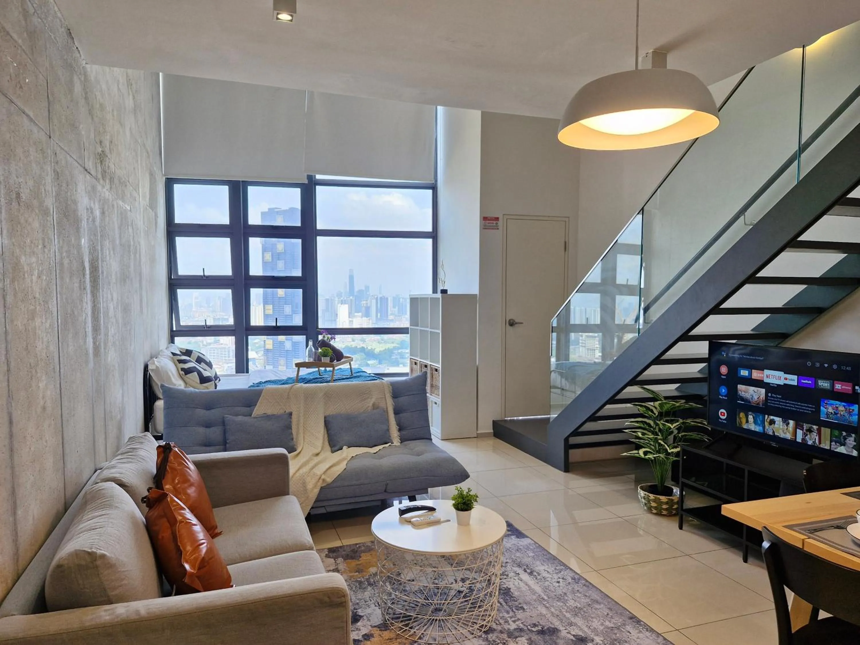 Living room in EkoCheras Duplex Suite by Ohana Home