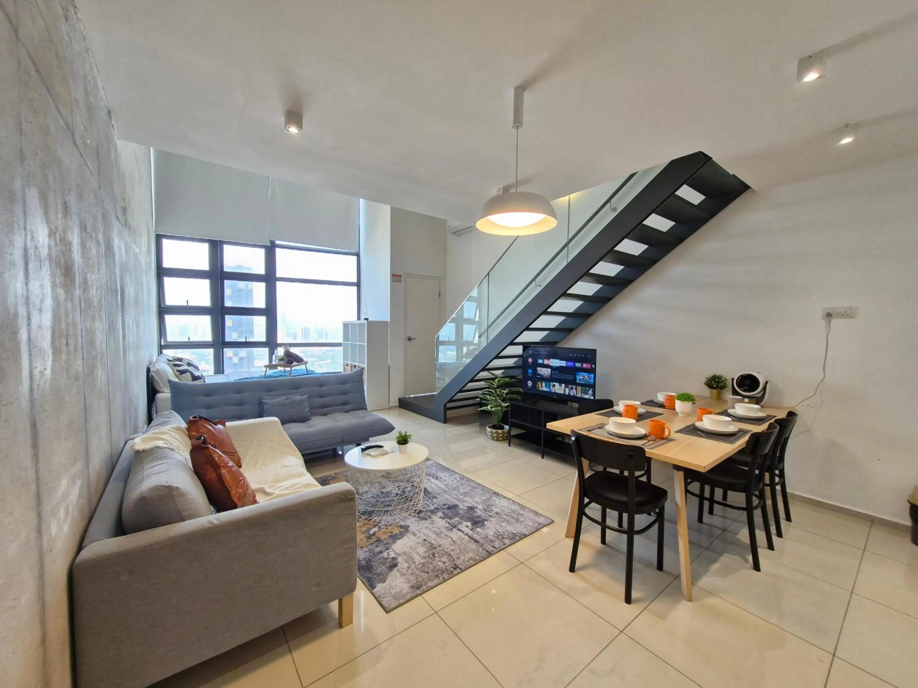 Living room in EkoCheras Duplex Suite by Ohana Home