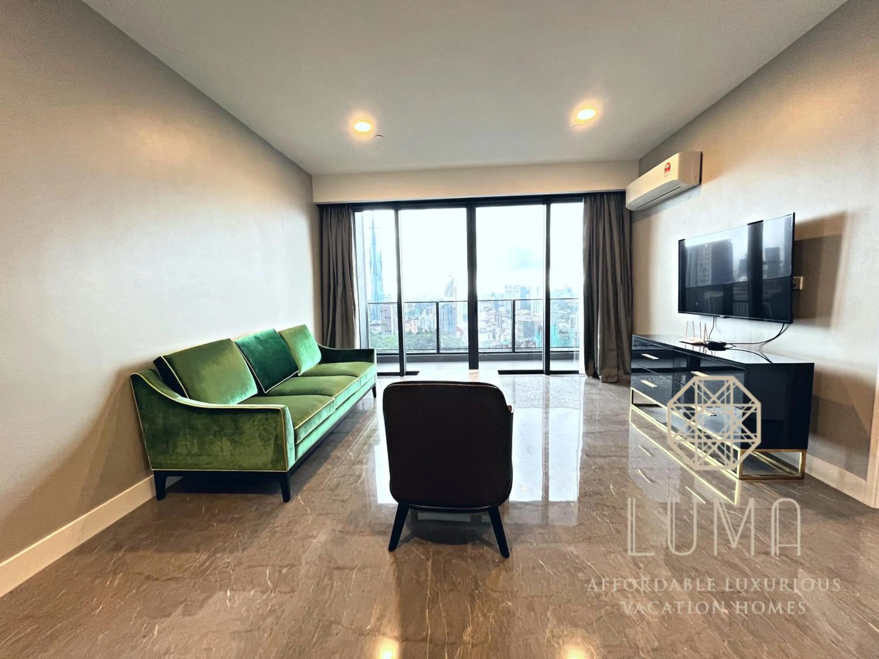 Living room in The Platinum 2 Kuala Lumpur by LUMA