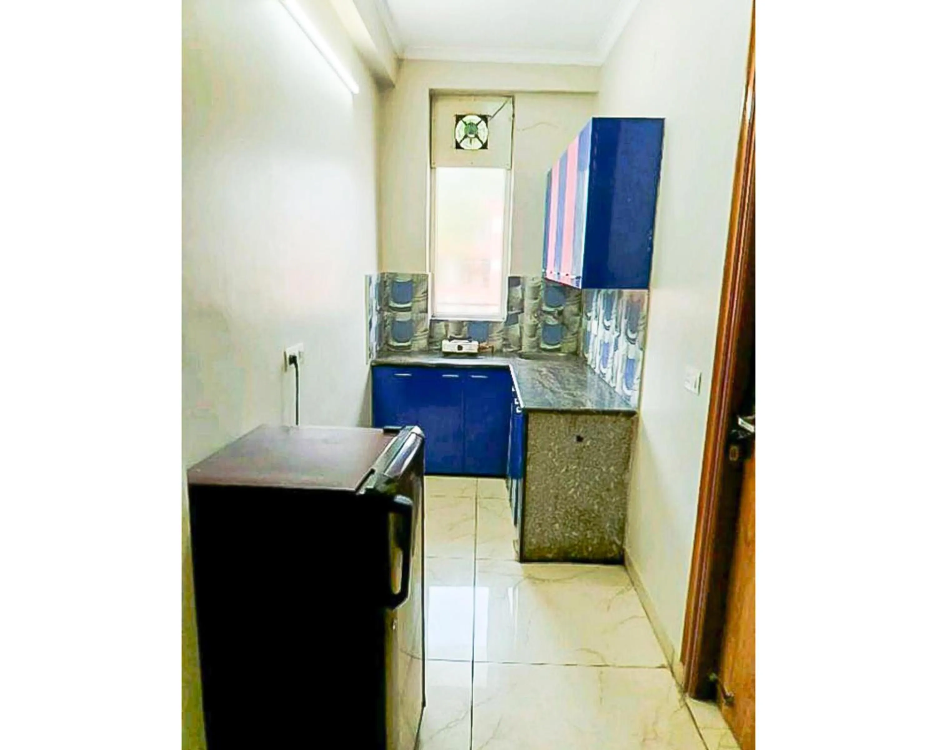 Kitchen or kitchenette in Hotel Shree Shyam By WB Inn