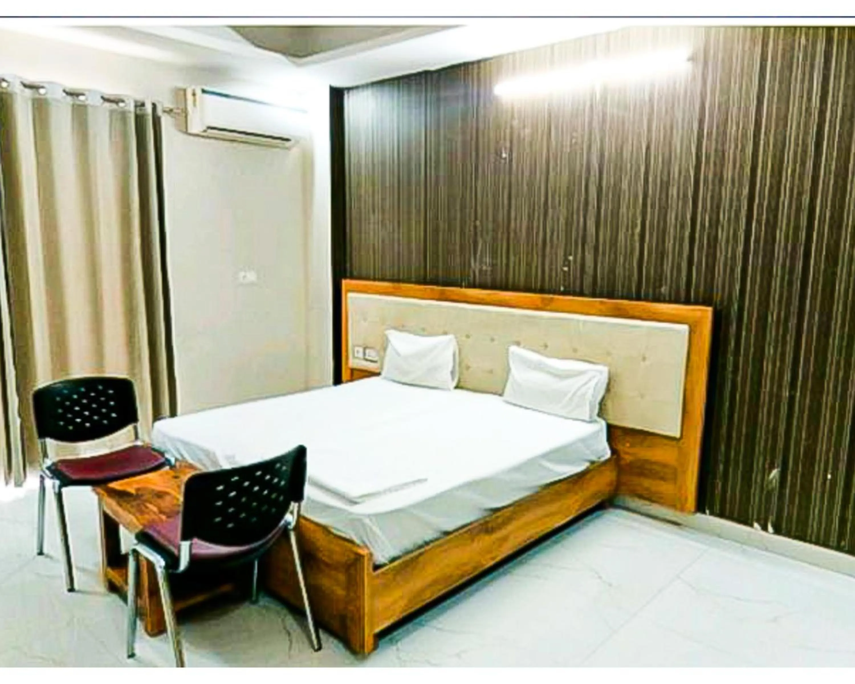 Photo of the whole room in Hotel Shree Shyam By WB Inn