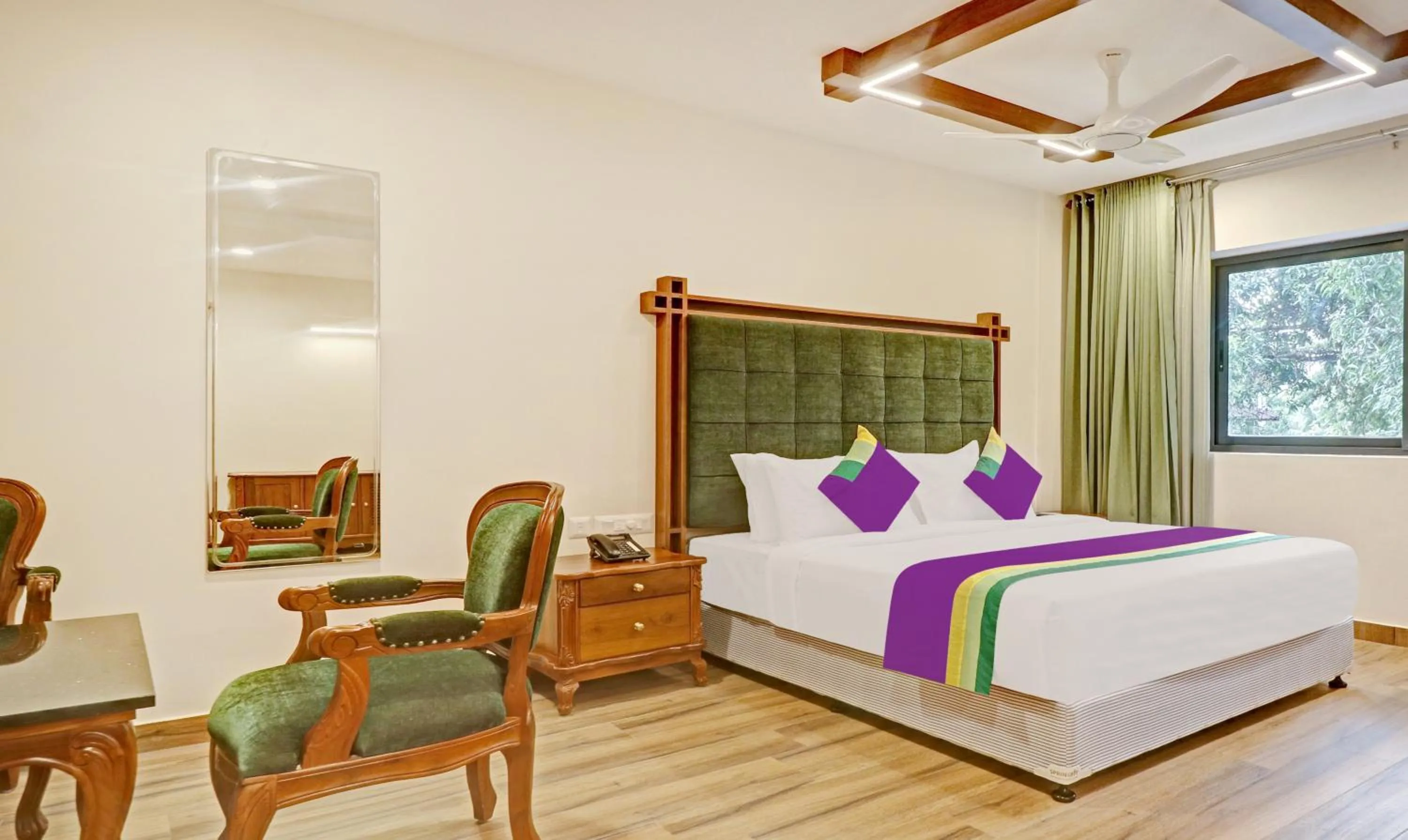 Bedroom, Bed in Treebo Premium Vahada 7 Minutes Drive From Ambalapuzha Sree Krishna Swamy Temple