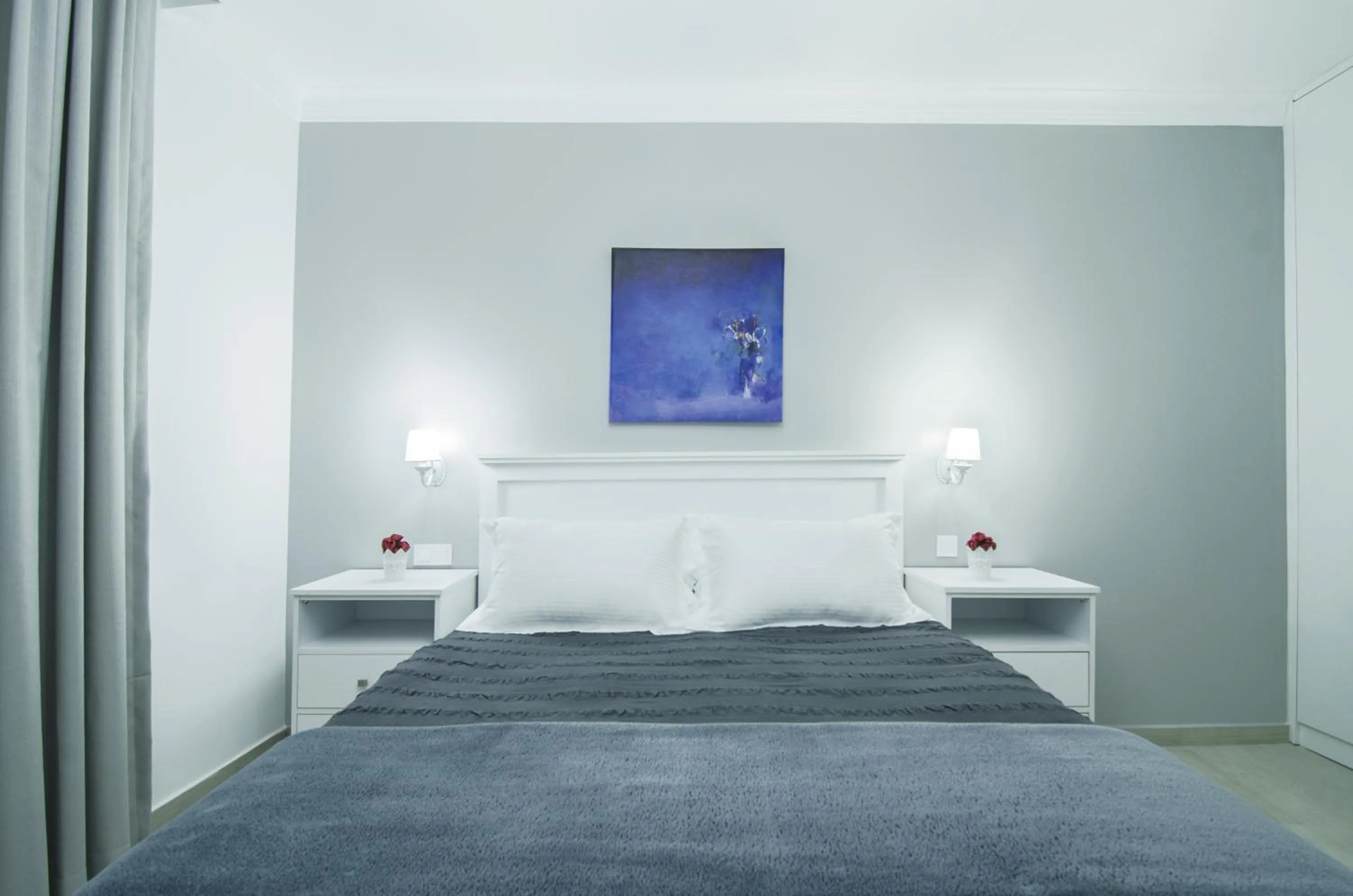 Bed in Rodina Suites Hotel