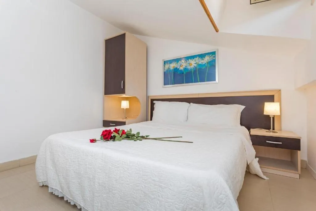 Bed in Sirina House Taormina