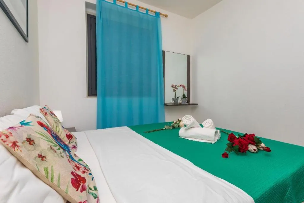 Bed in Sirina House Taormina