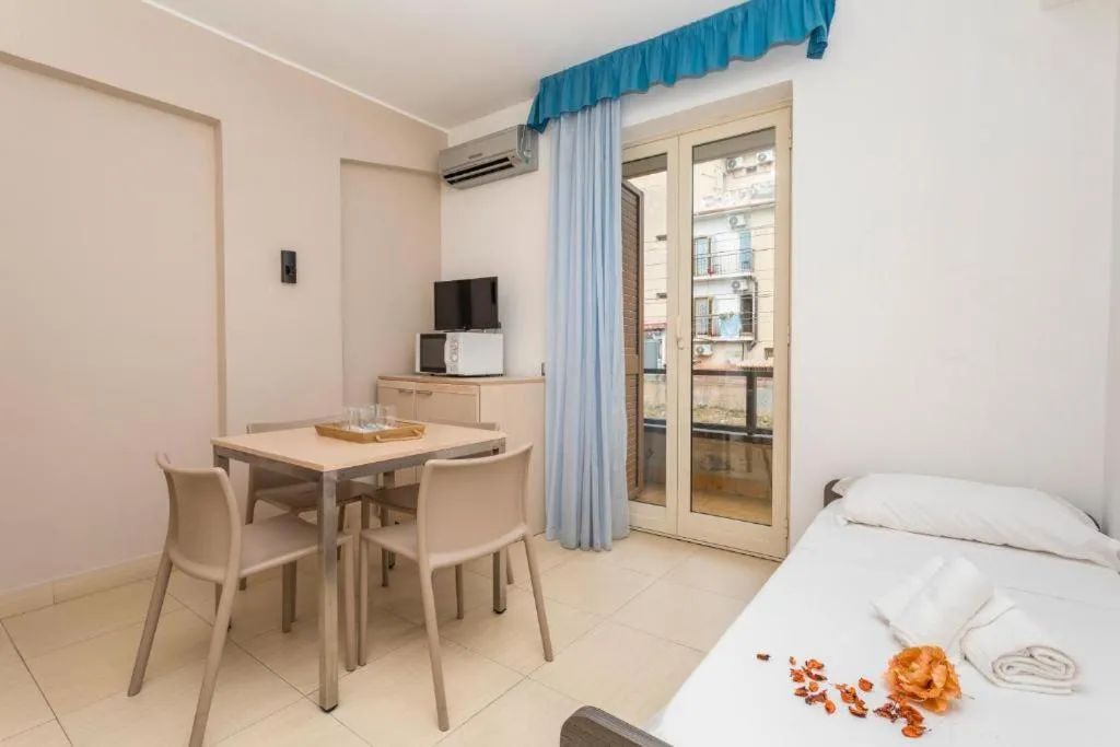 Bed in Sirina House Taormina