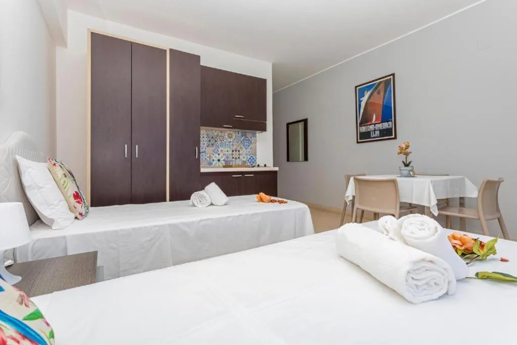 Bed in Sirina House Taormina