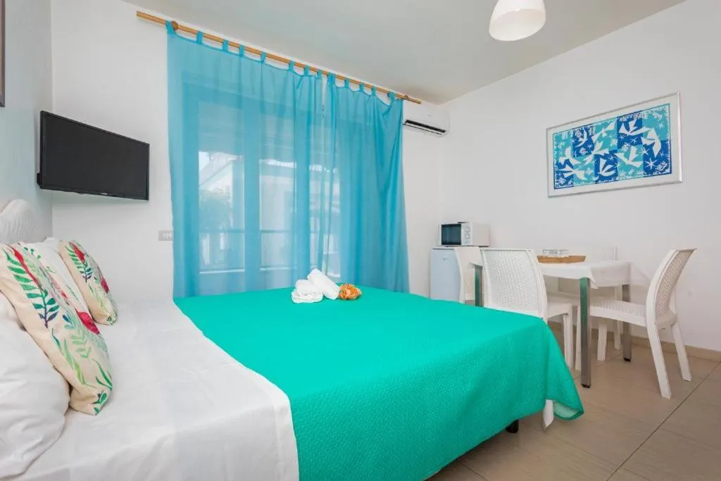 Bed in Sirina House Taormina