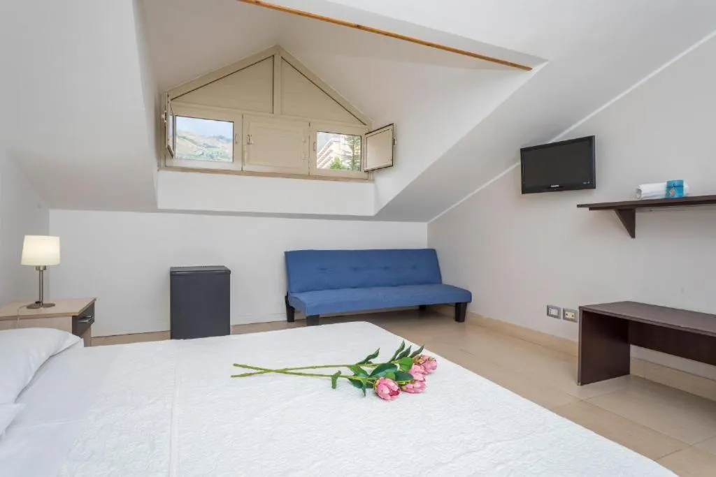 Bed in Sirina House Taormina