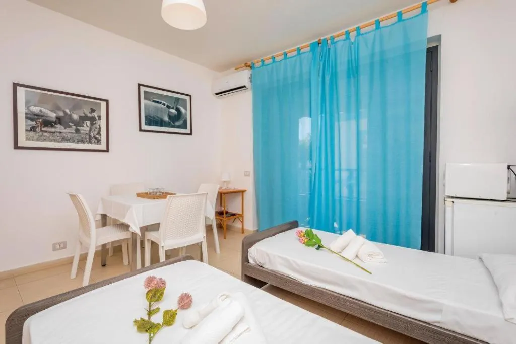 Bed in Sirina House Taormina