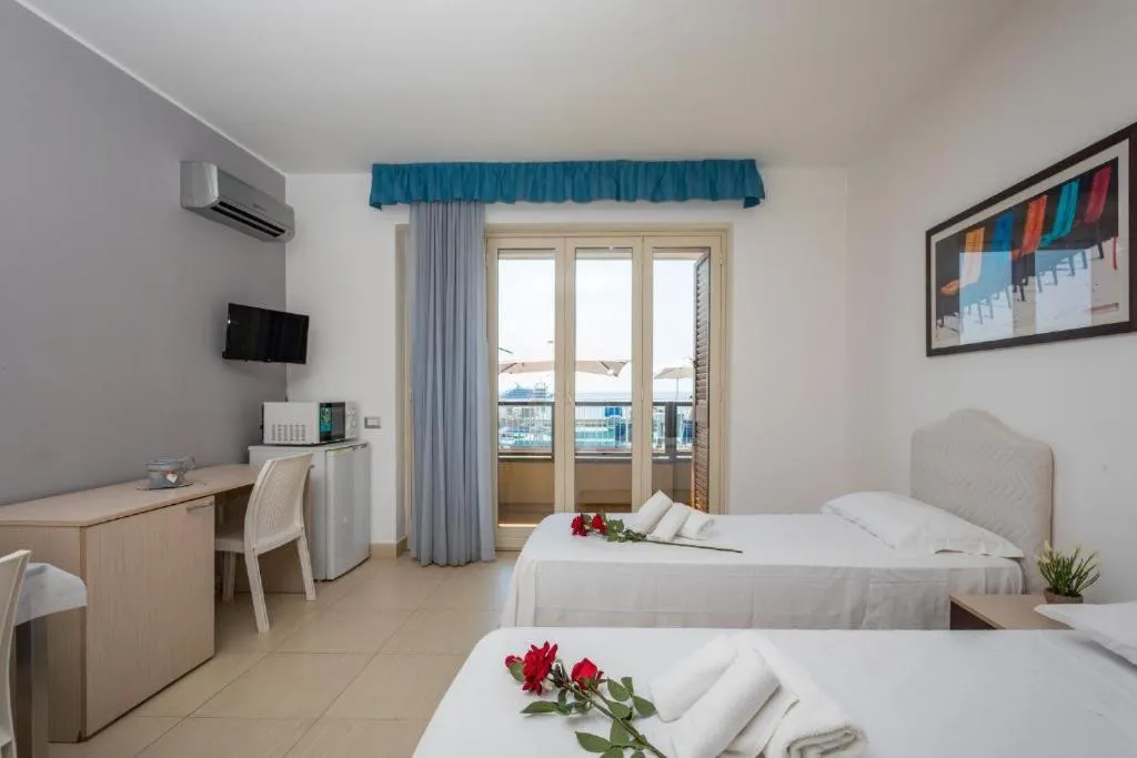 Bed in Sirina House Taormina