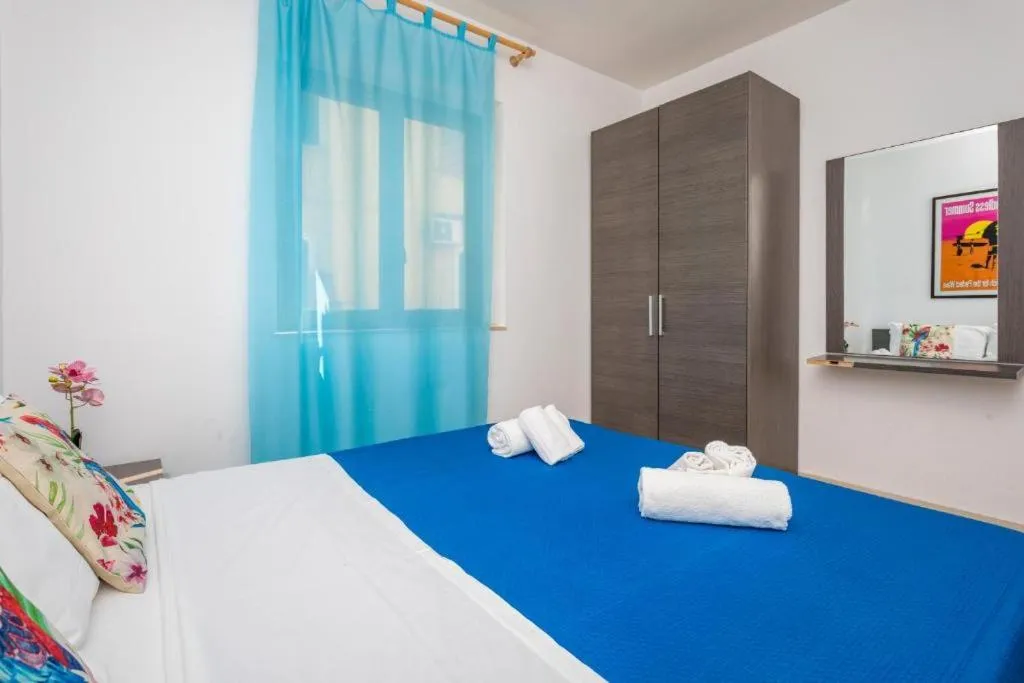 Bed in Sirina House Taormina