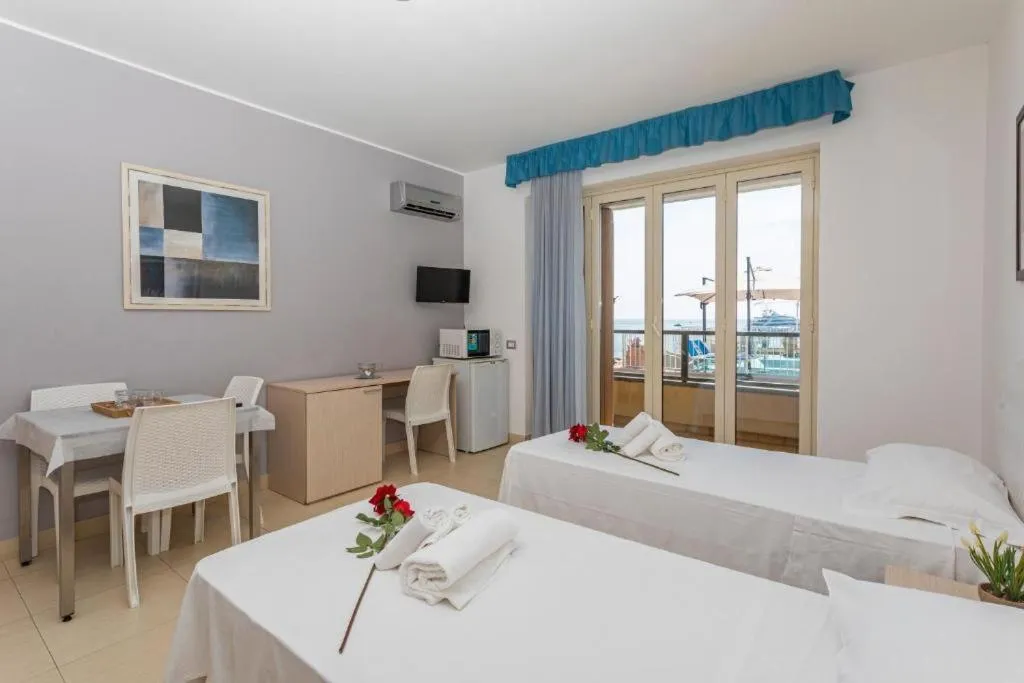 Bed in Sirina House Taormina