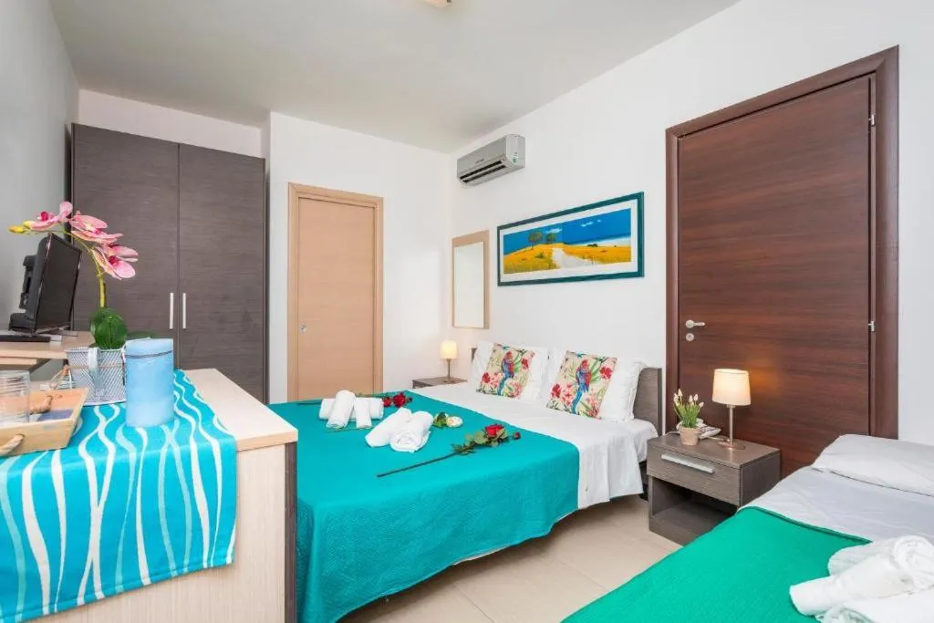 Bed in Sirina House Taormina