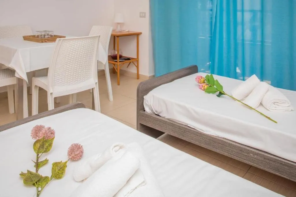 Bed in Sirina House Taormina