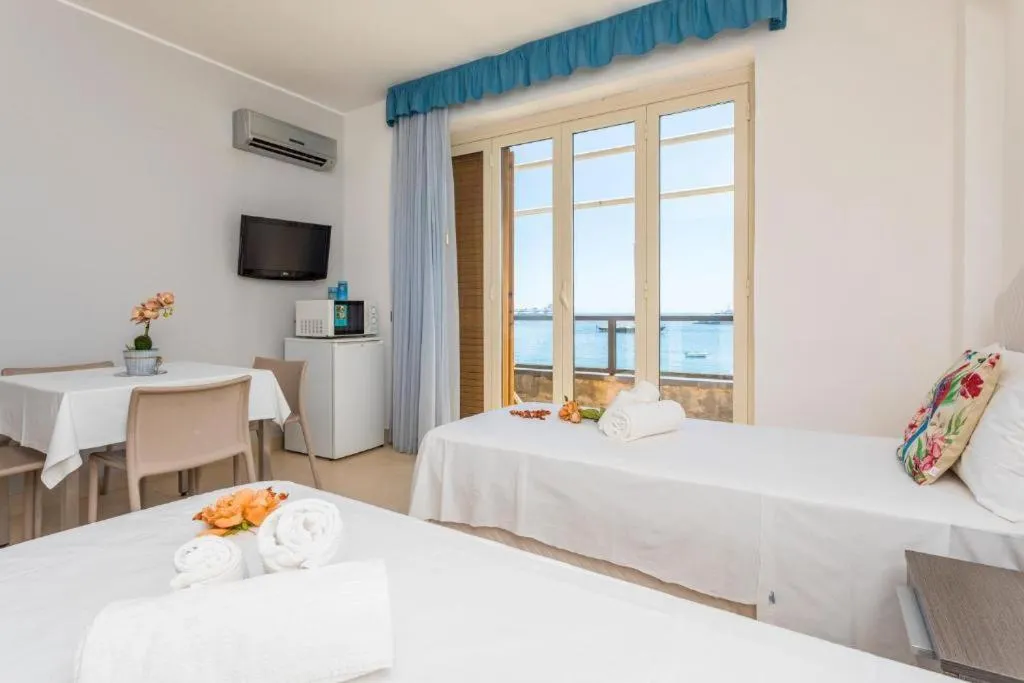 Bed in Sirina House Taormina