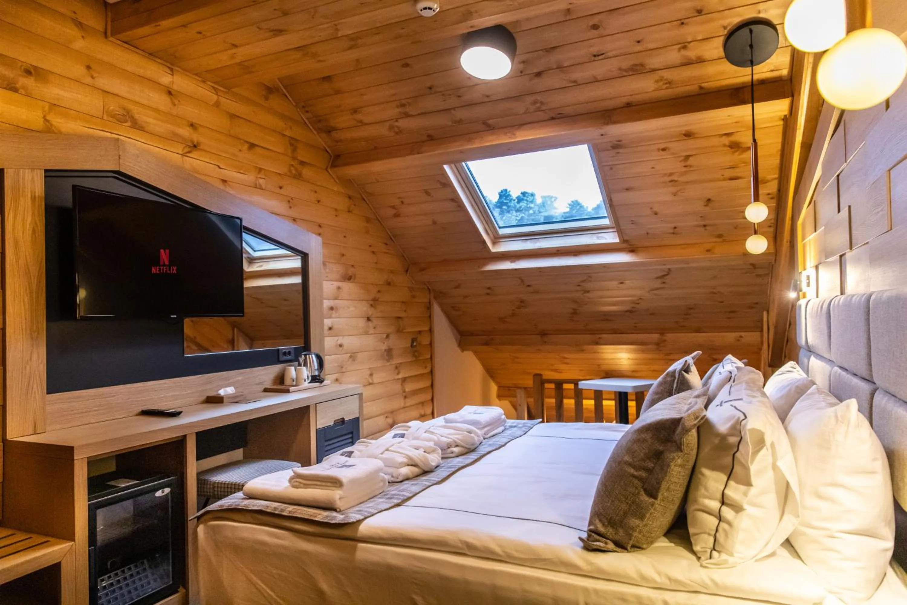 Bed in SARPİNO MOUNTAİN HOTEL