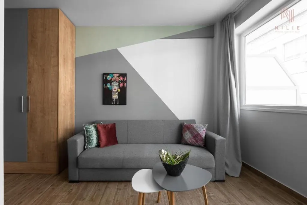 Living room in Big Apple, Nilie Hospitality MGMT