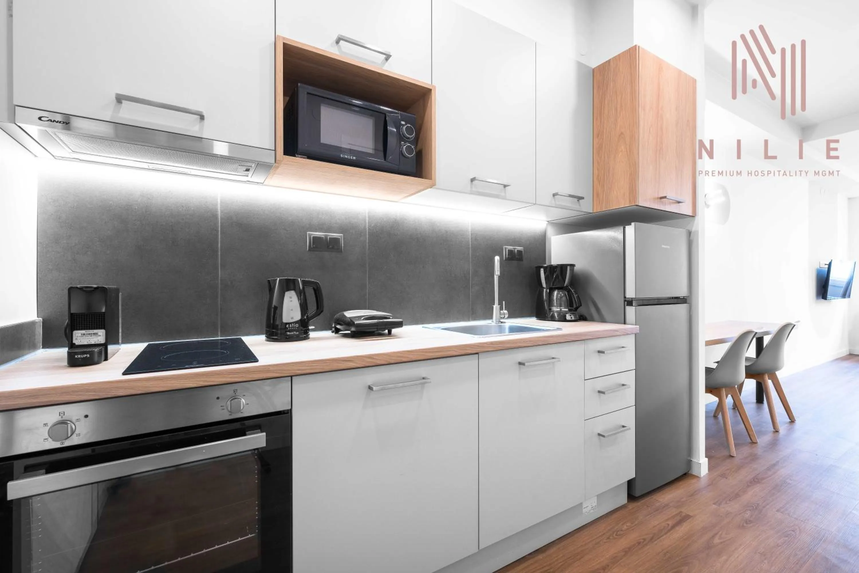 Kitchen or kitchenette in Big Apple, Nilie Hospitality MGMT