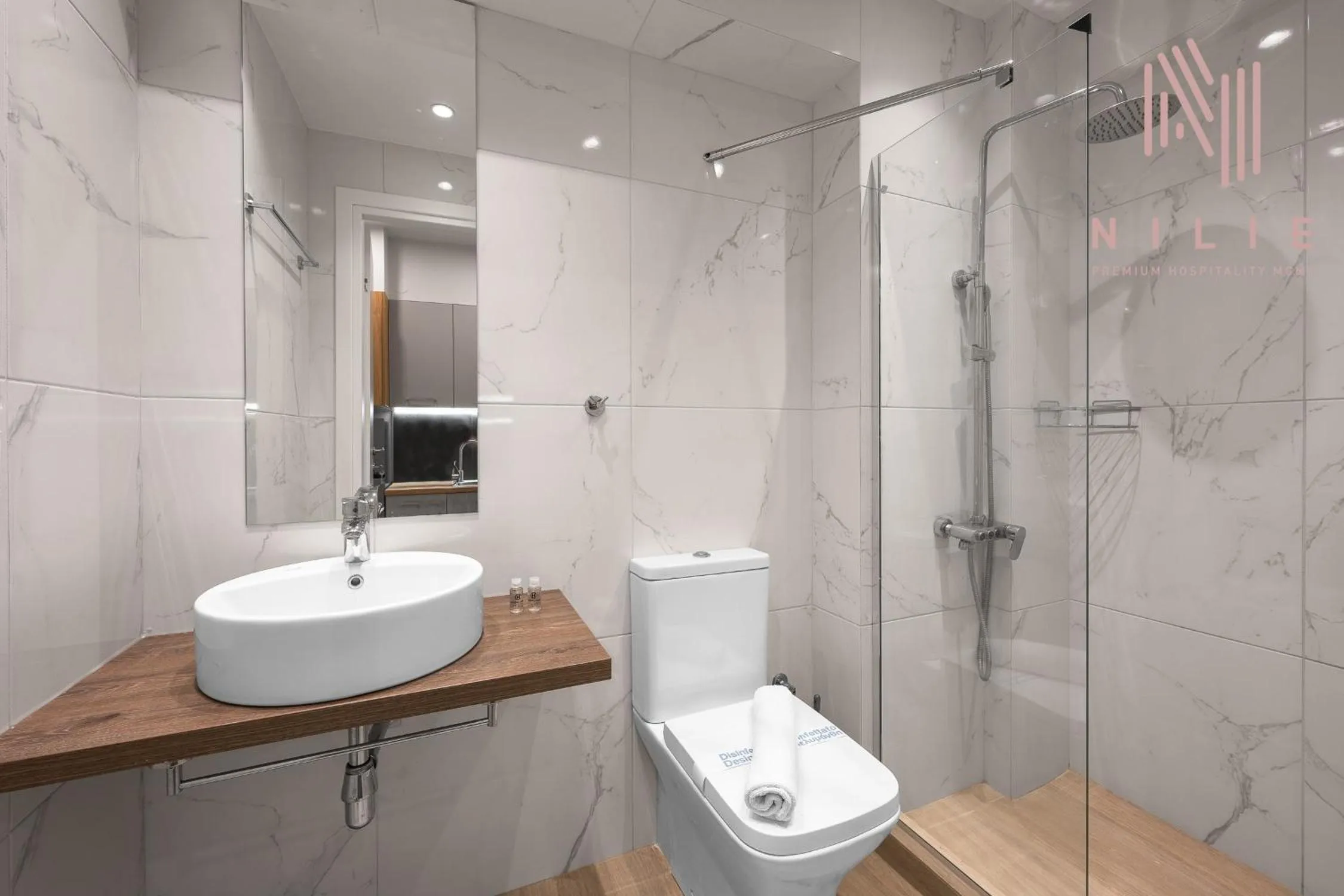 Shower in Big Apple, Nilie Hospitality MGMT