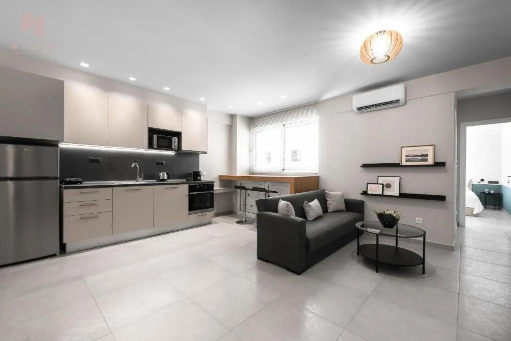 Kitchen or kitchenette in Big Apple, Nilie Hospitality MGMT