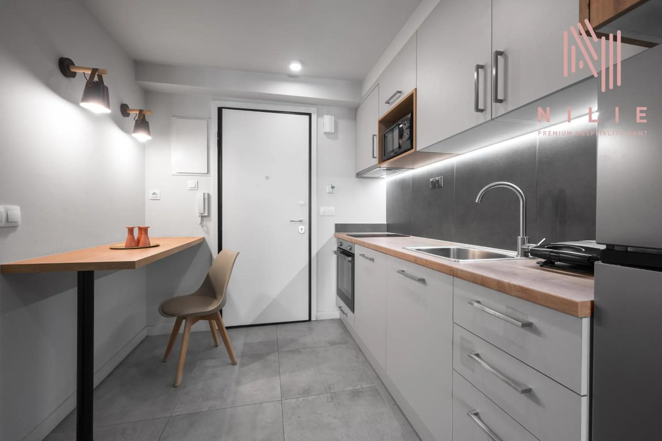 Kitchen or kitchenette in Big Apple, Nilie Hospitality MGMT