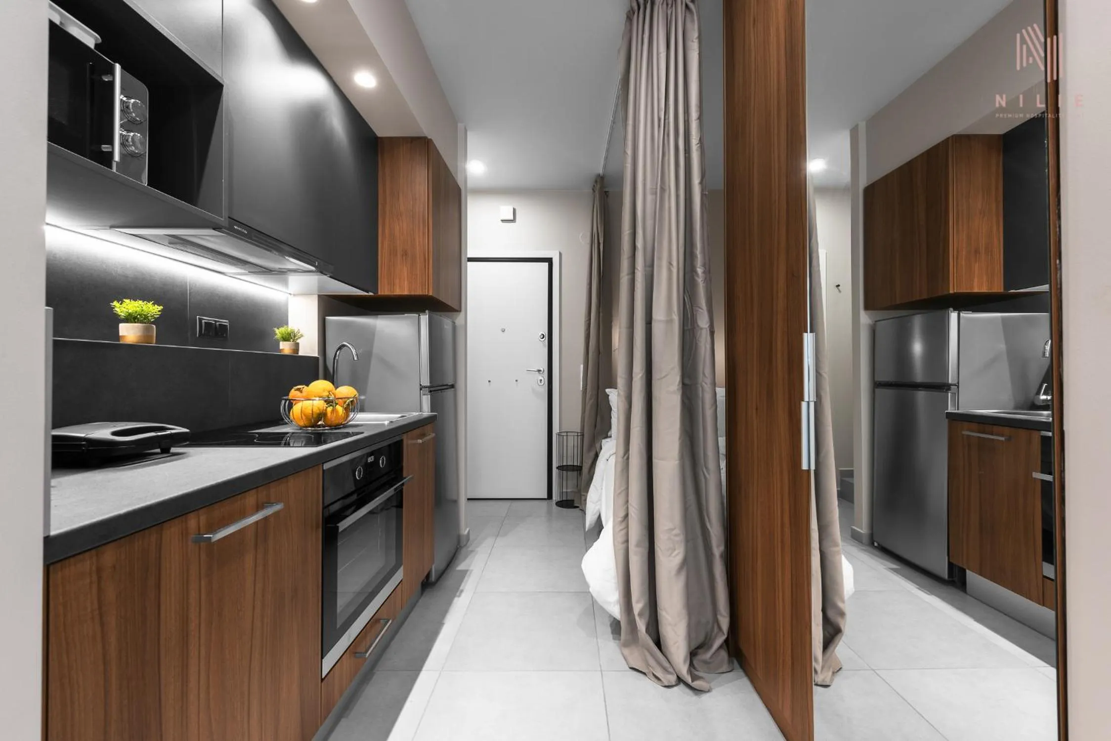 Kitchen or kitchenette in Big Apple, Nilie Hospitality MGMT