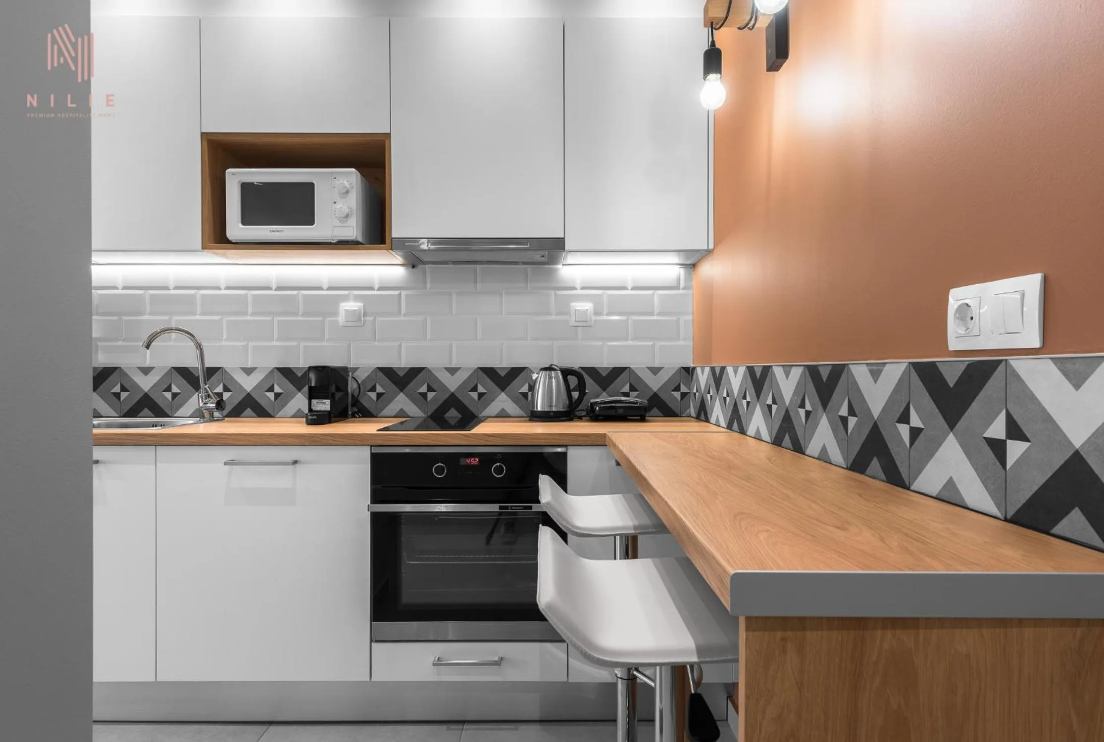 Kitchen or kitchenette in Big Apple, Nilie Hospitality MGMT