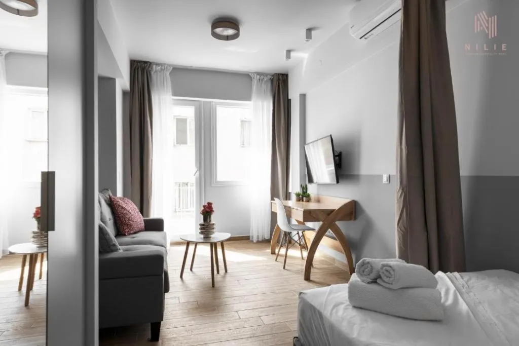 Living room, Bed in Big Apple, Nilie Hospitality MGMT