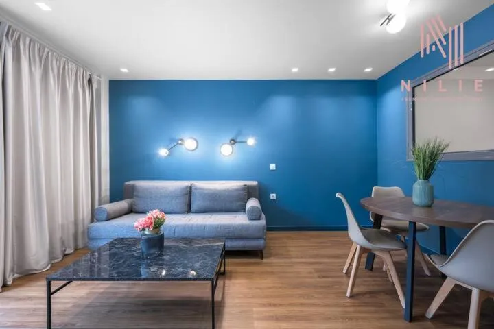 Living room, Bed in Big Apple, Nilie Hospitality MGMT