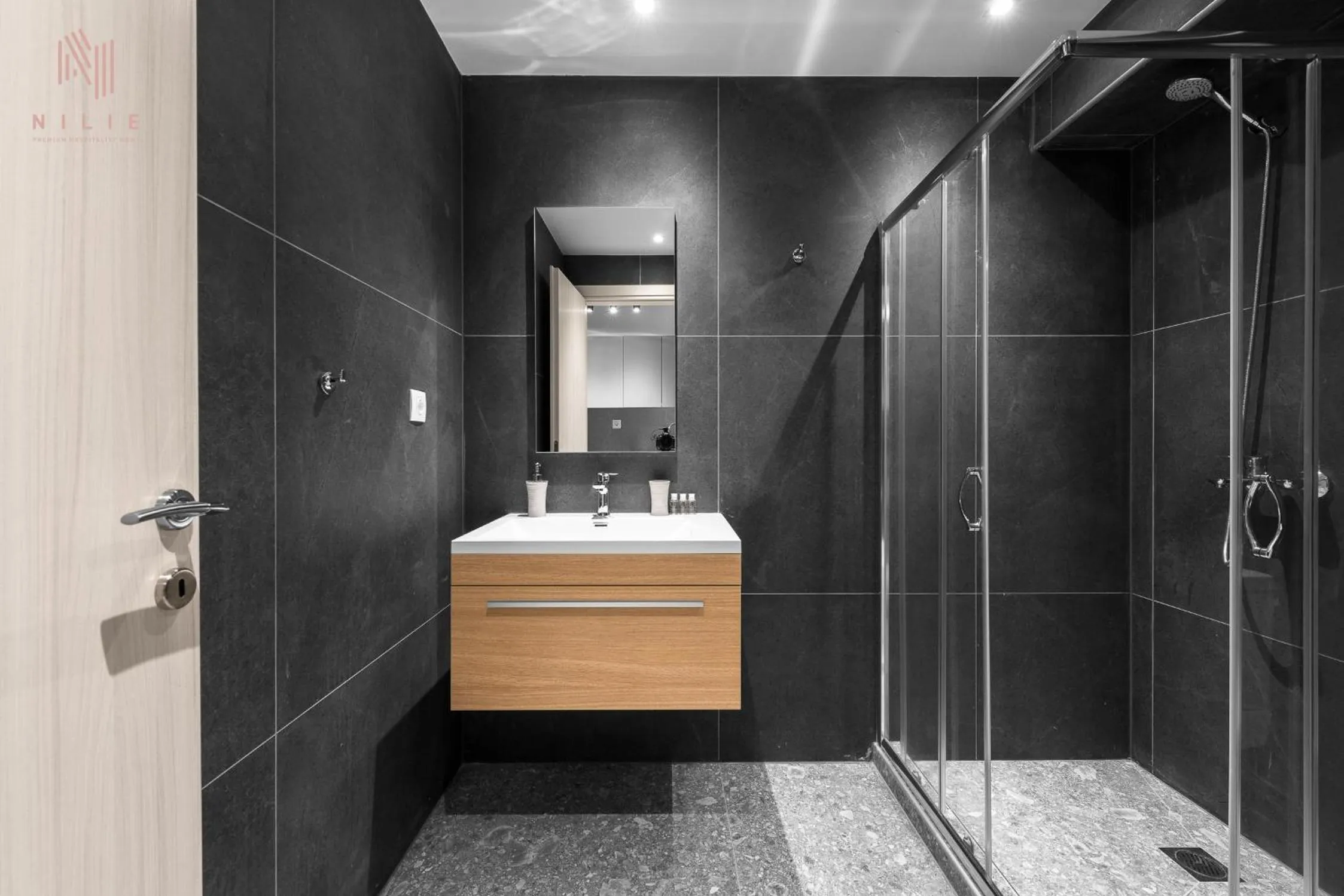 Shower in Big Apple, Nilie Hospitality MGMT