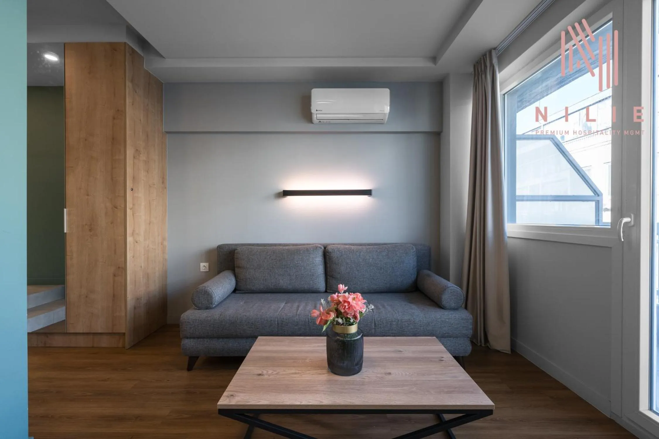 Living room in Big Apple, Nilie Hospitality MGMT