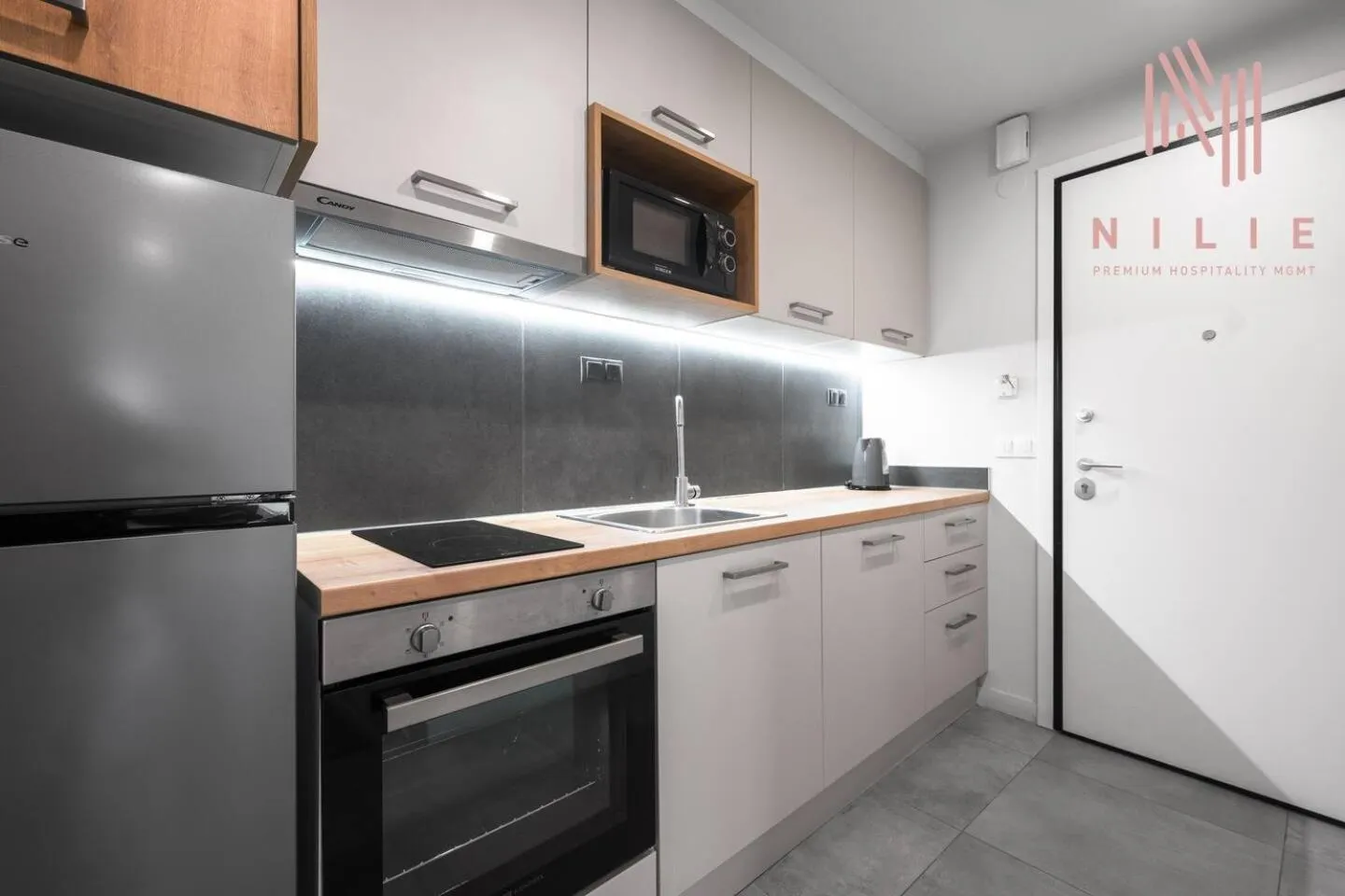 Kitchen or kitchenette in Big Apple, Nilie Hospitality MGMT