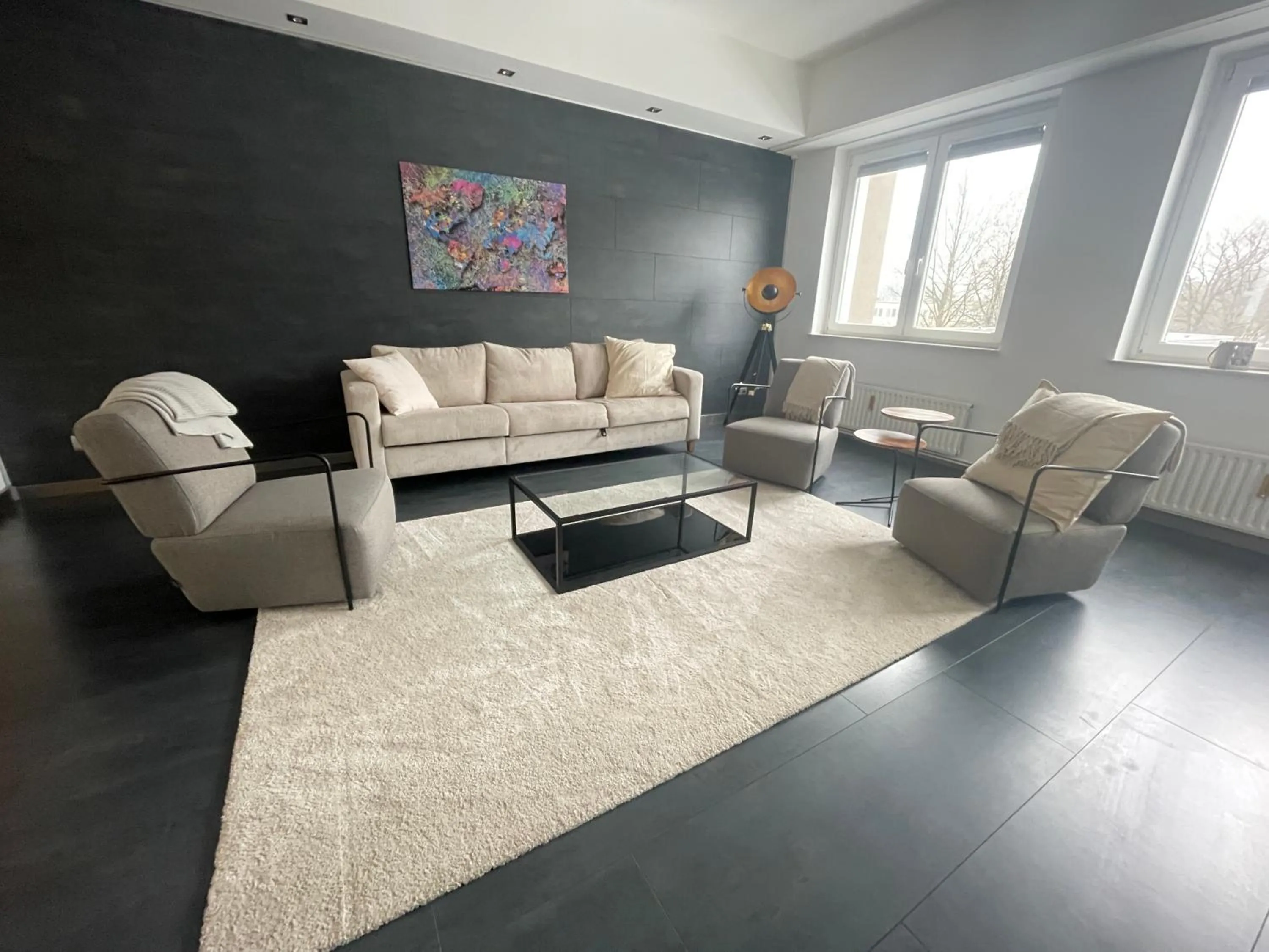 Living room in TruRetreats Design Loft für 8 Personen I Riesige Küche I eCharger I 65z SmartTV I 150qm