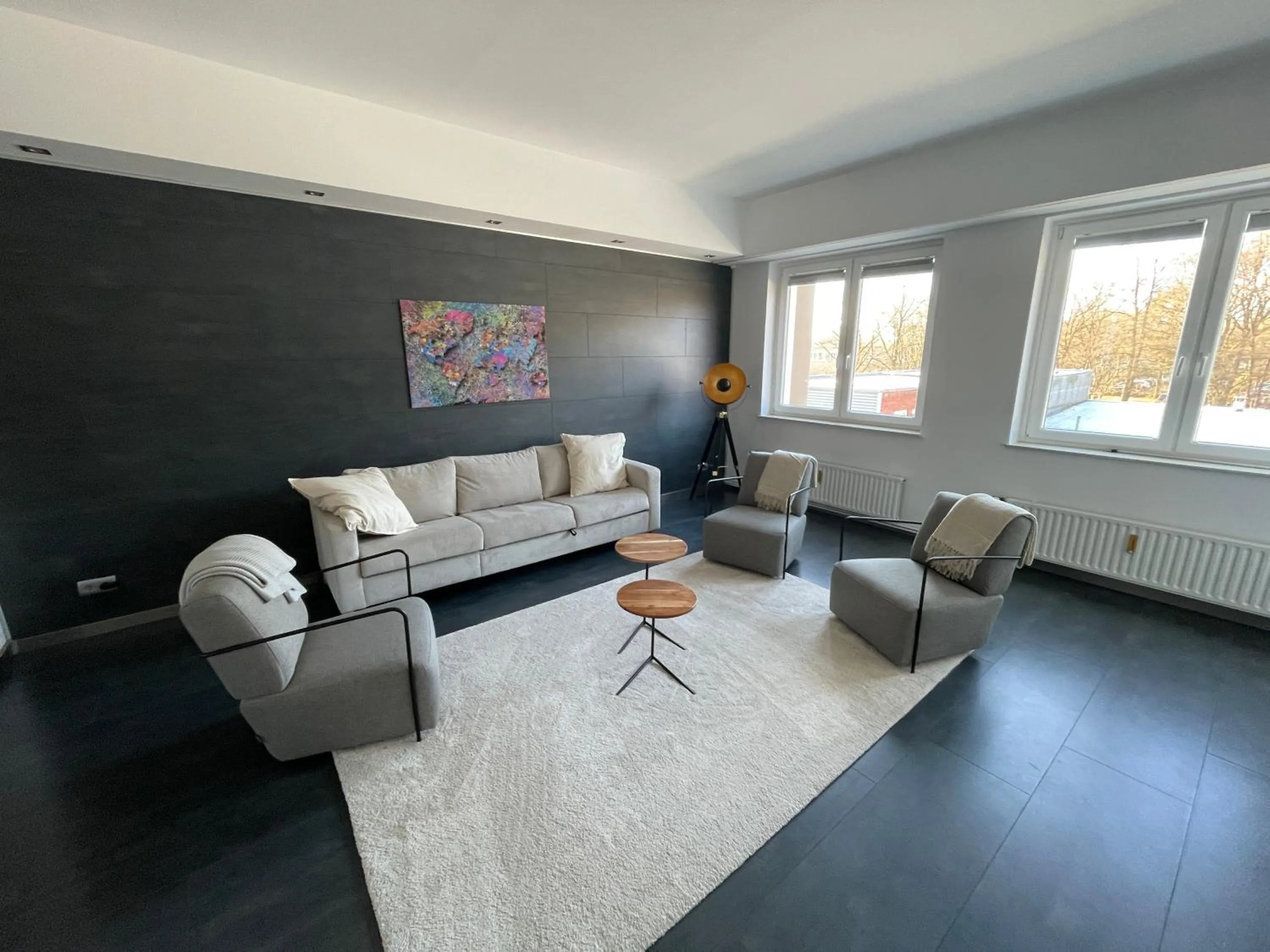Living room in TruRetreats Design Loft für 8 Personen I Riesige Küche I eCharger I 65z SmartTV I 150qm