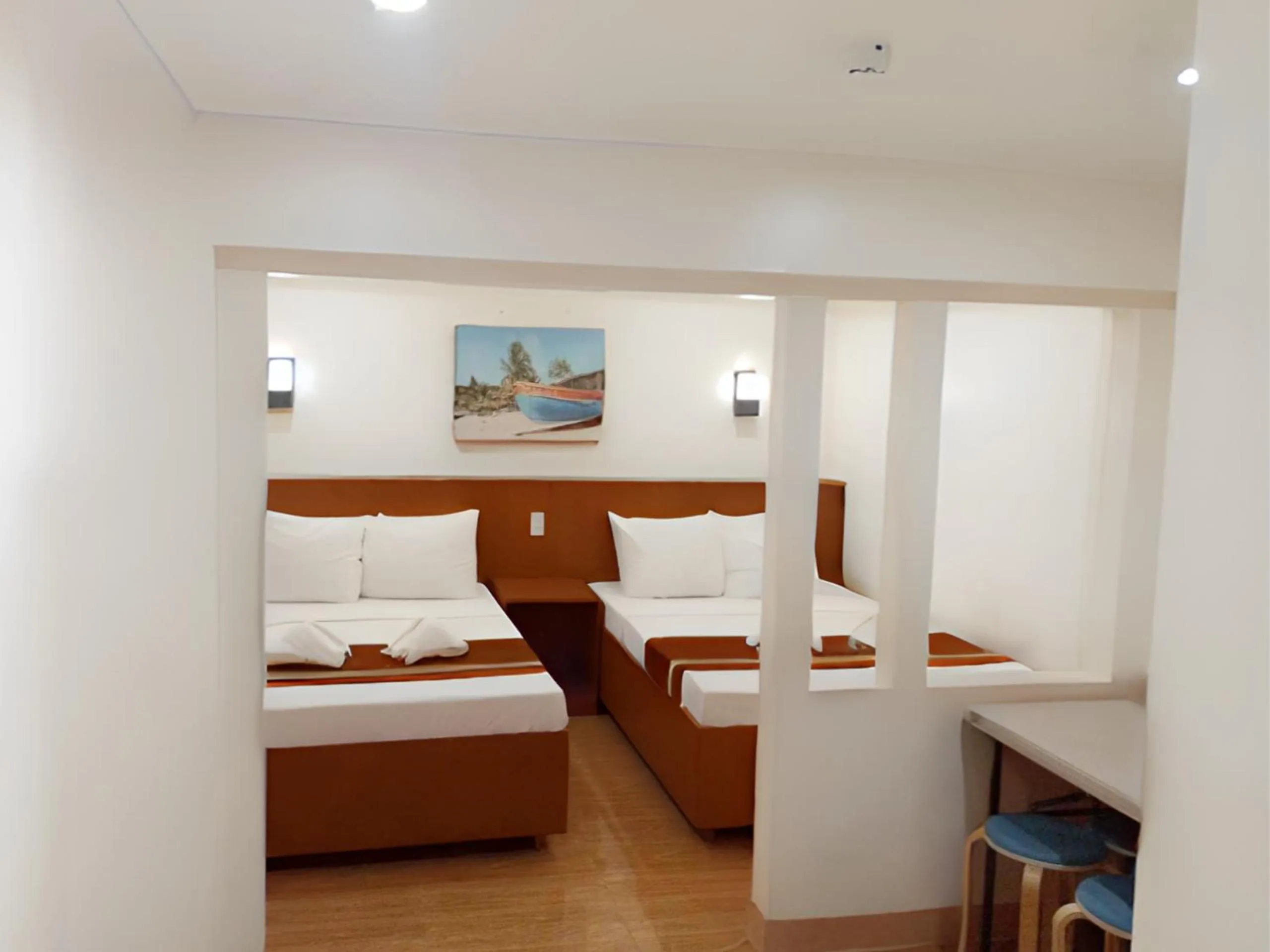 Bed in Dy Heritage Suites