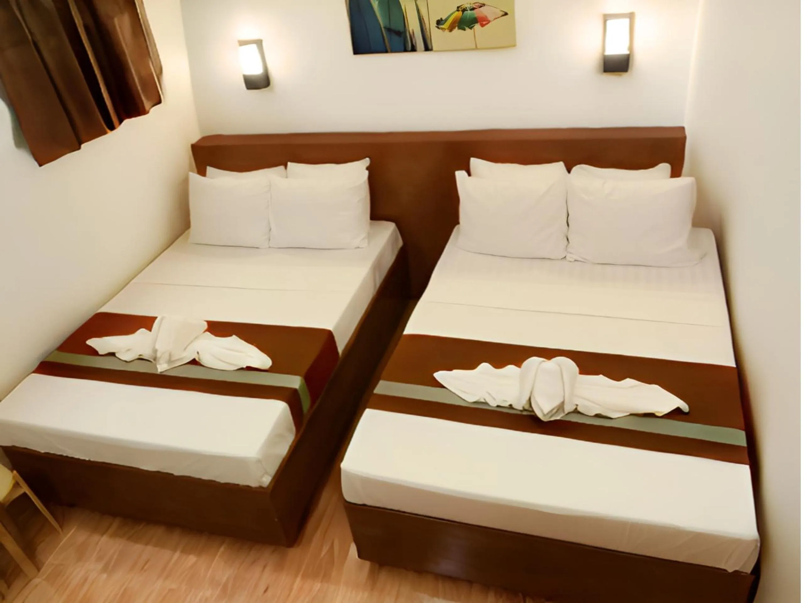 Bed in Dy Heritage Suites