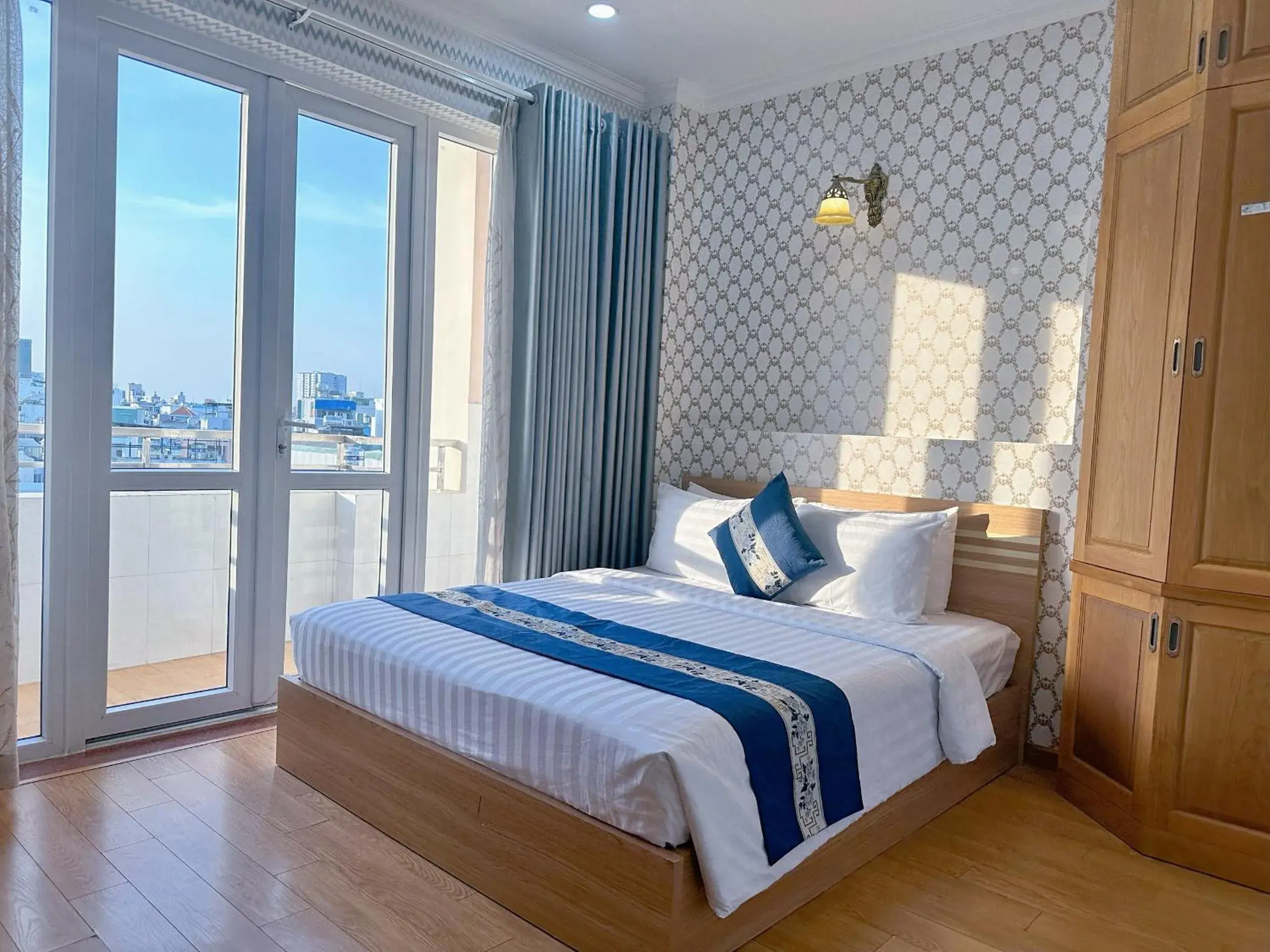 Property building, Bed in Tra My Hotel - SaiGon Center Property building, Bed in Tra My Hotel - SaiGon Center