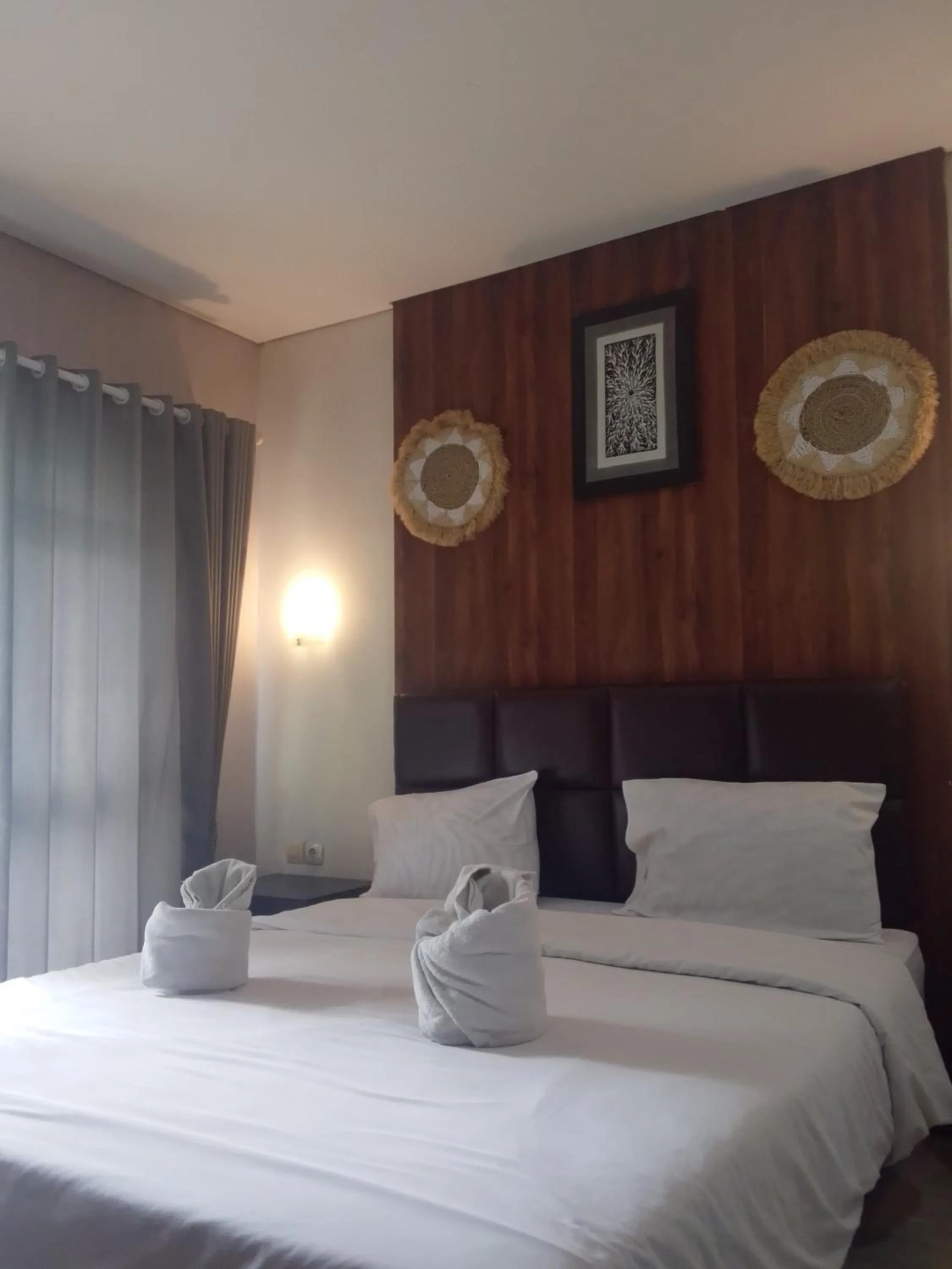 Bed in NEW KUBU DI BUKIT apartemen & motor bike rental near beach and 10 minute to airpot