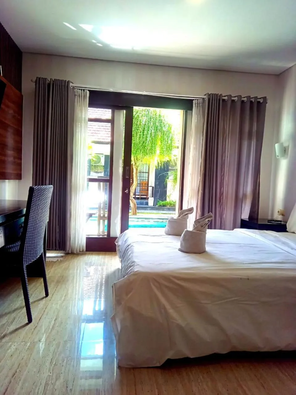 Bed in NEW KUBU DI BUKIT apartemen & motor bike rental near beach and 10 minute to airpot