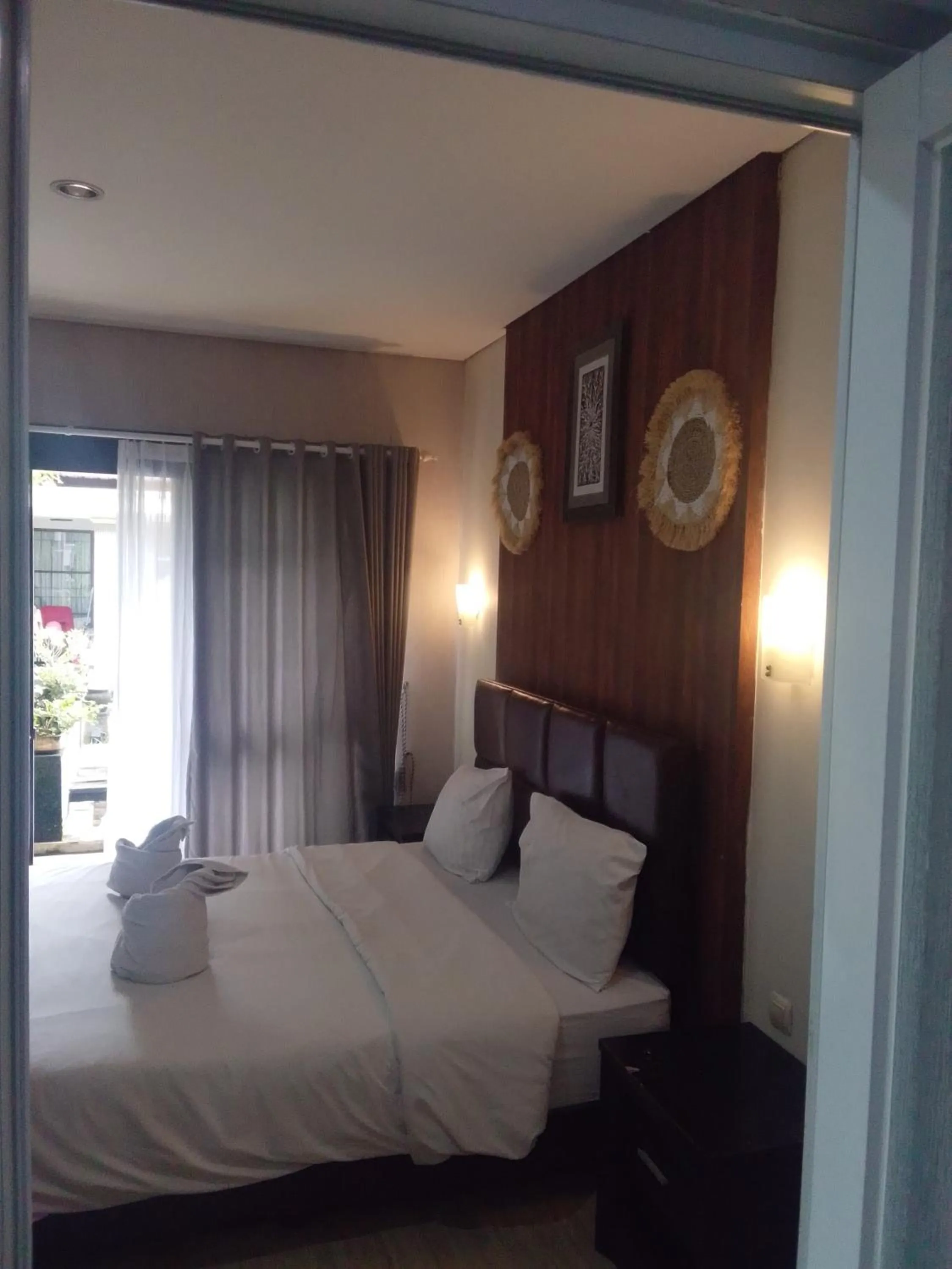 Bed in NEW KUBU DI BUKIT apartemen & motor bike rental near beach and 10 minute to airpot