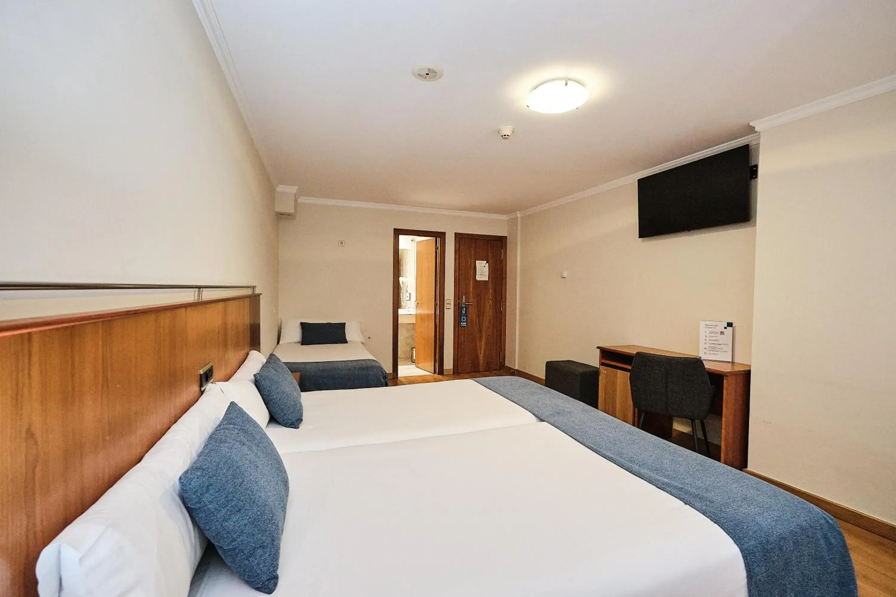 Bed in Hotel Ciudad de Compostela Bed in Hotel Ciudad de Compostela