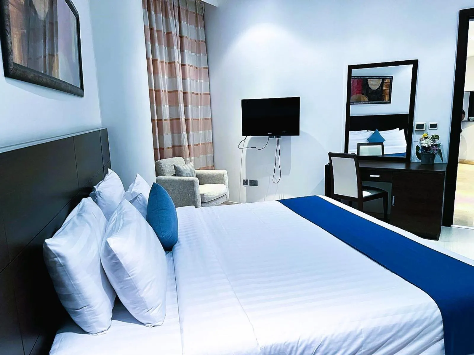 Bed in Butterfly Residence