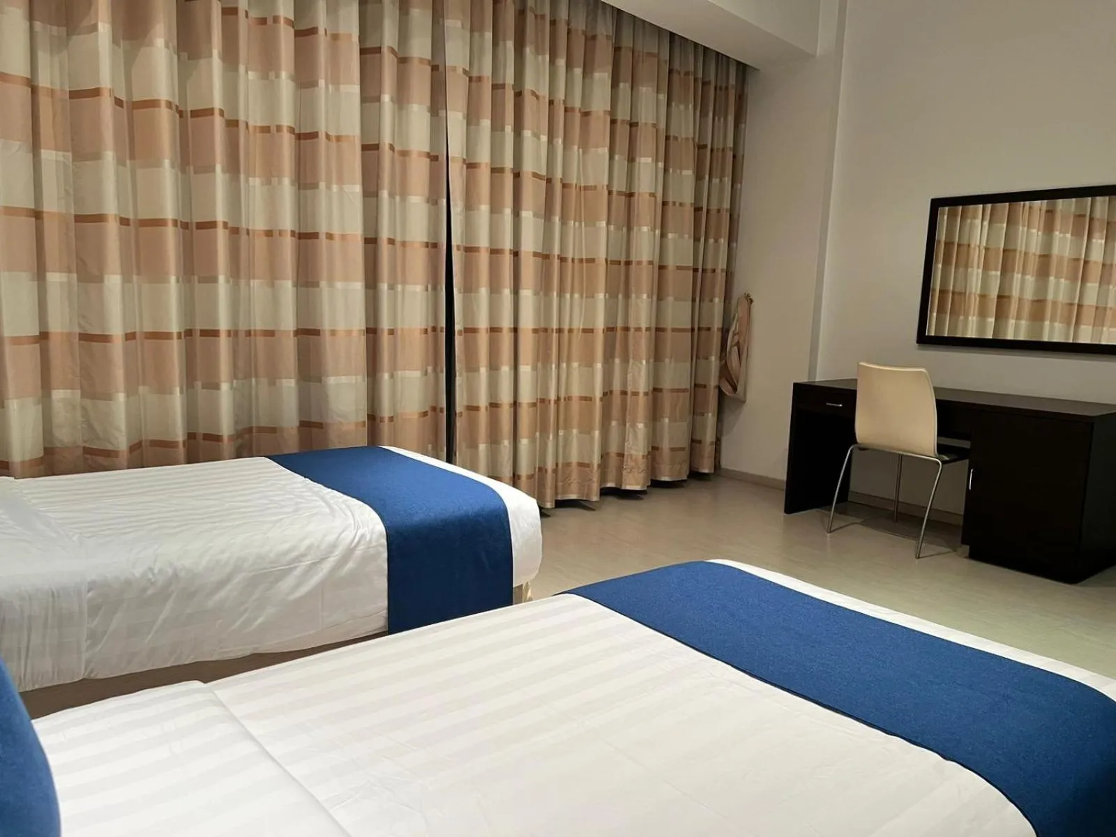 Bed in Butterfly Residence