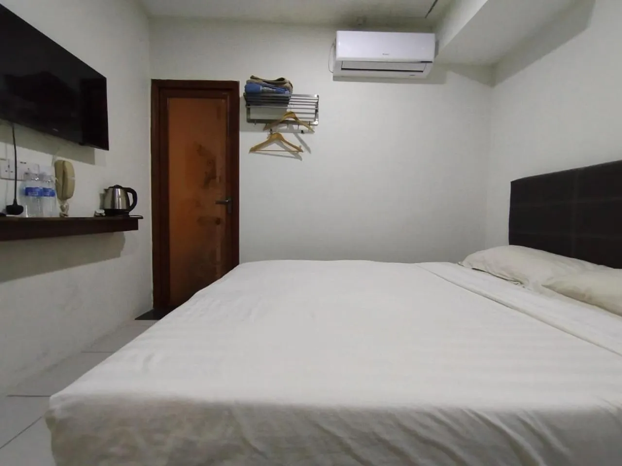 Bedroom in Super OYO 90668 Joy Inn