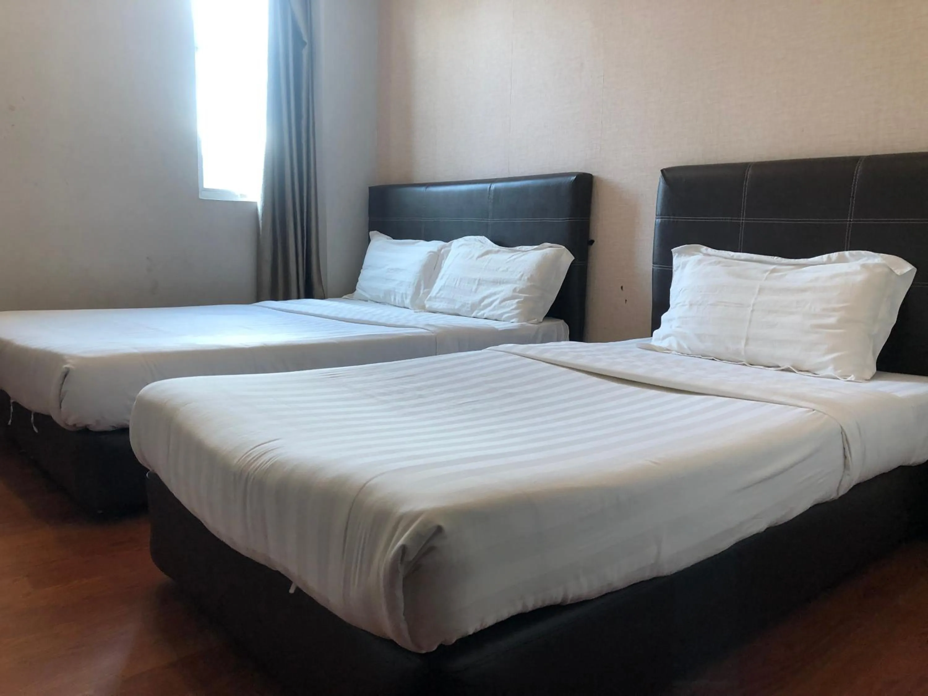 Bedroom in Super OYO 90668 Joy Inn