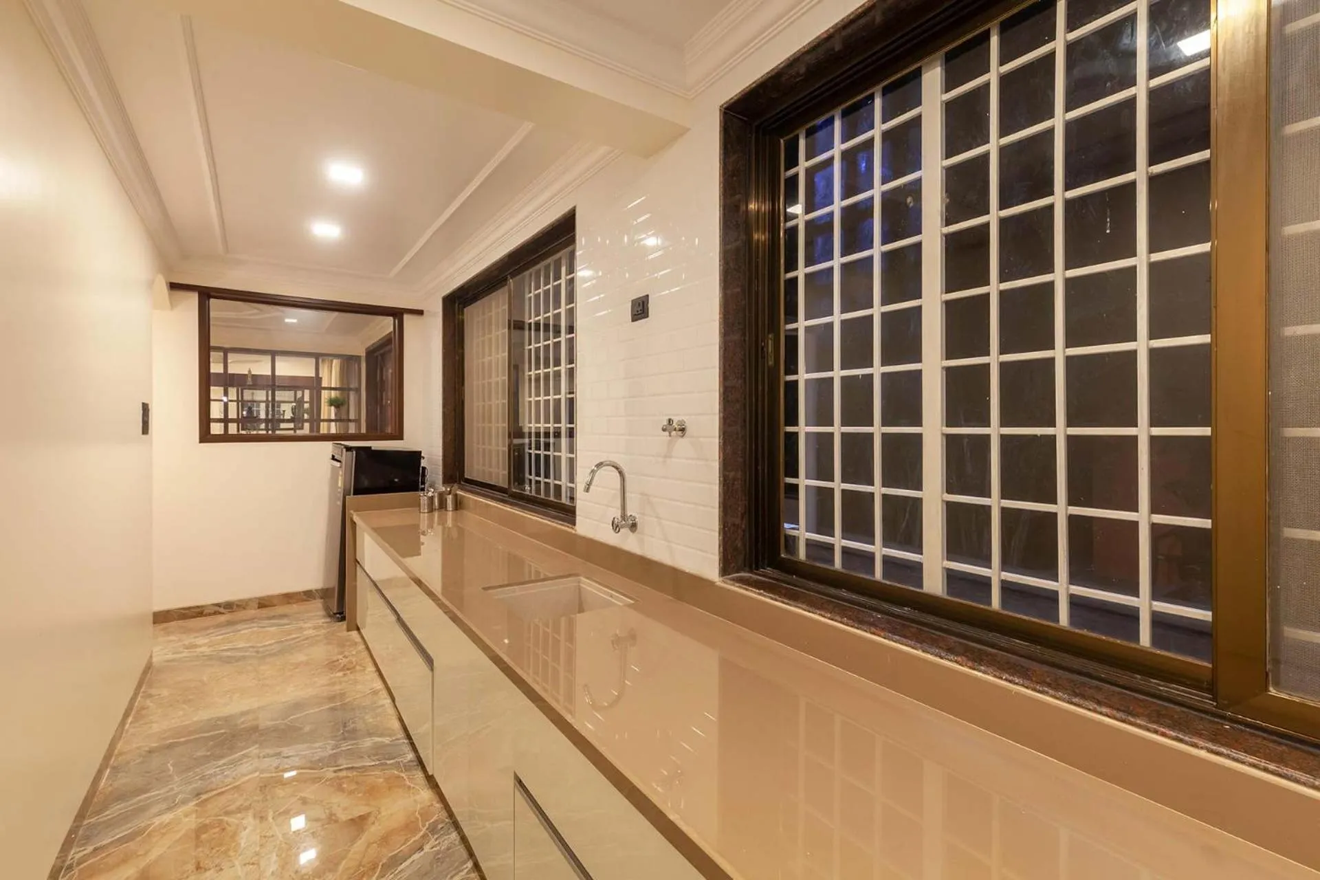 kitchen in StayVista's Lake La Vie - Tranquil Lake-View Villa Amidst Farmland with Pool and Poolside Gazebo - Proximity to Sula