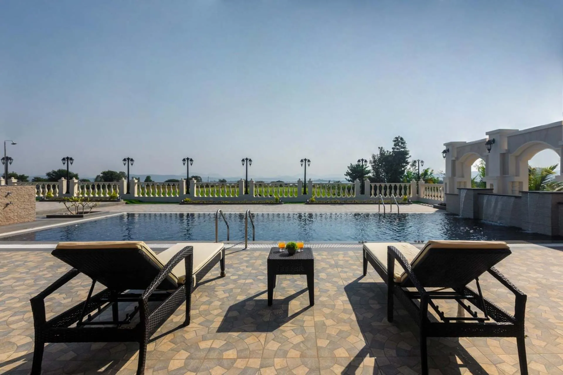 Swimming pool in StayVista's Lake La Vie - Tranquil Lake-View Villa Amidst Farmland with Pool and Poolside Gazebo - Proximity to Sula