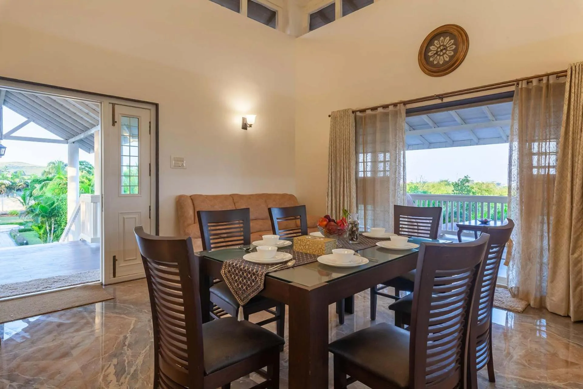 Dining area in StayVista's Lake La Vie - Tranquil Lake-View Villa Amidst Farmland with Pool and Poolside Gazebo - Proximity to Sula