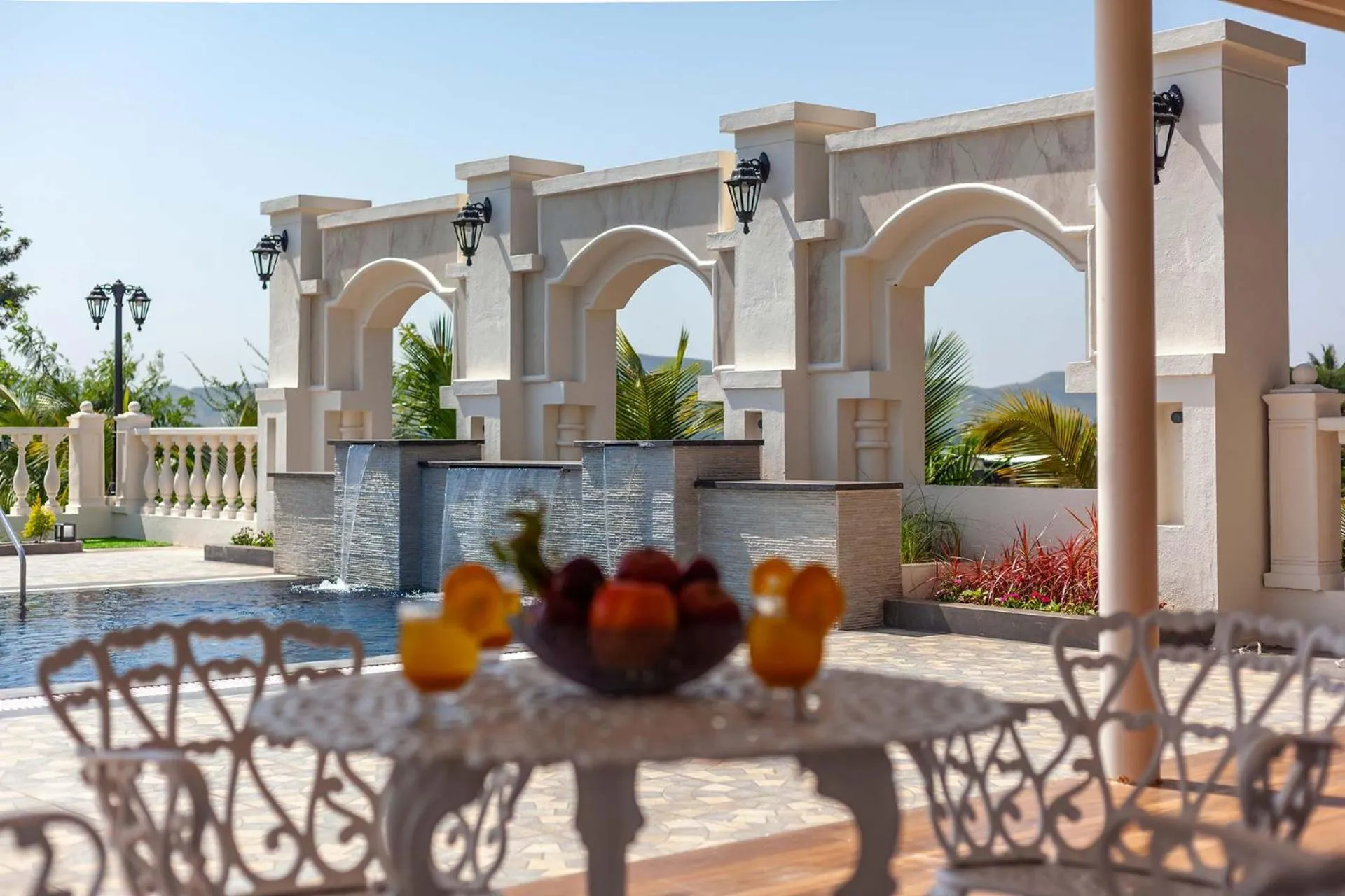 Pool view in StayVista's Lake La Vie - Tranquil Lake-View Villa Amidst Farmland with Pool and Poolside Gazebo - Proximity to Sula